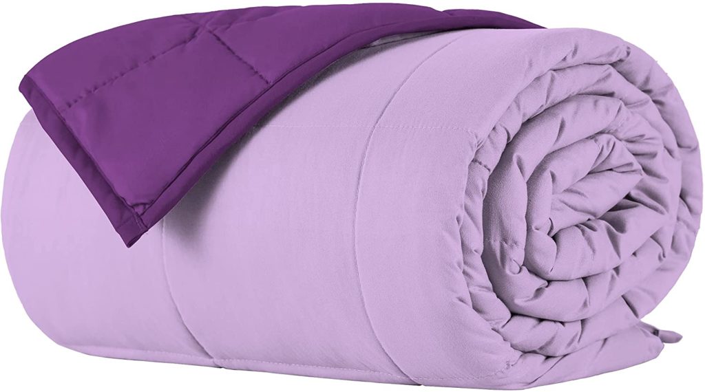 neatly rolled two toned reversible purple weighted blanket
