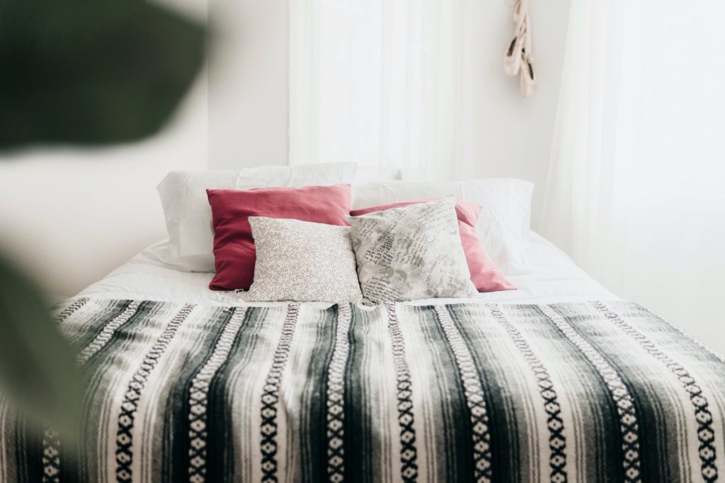patterned flannel comforter on bed