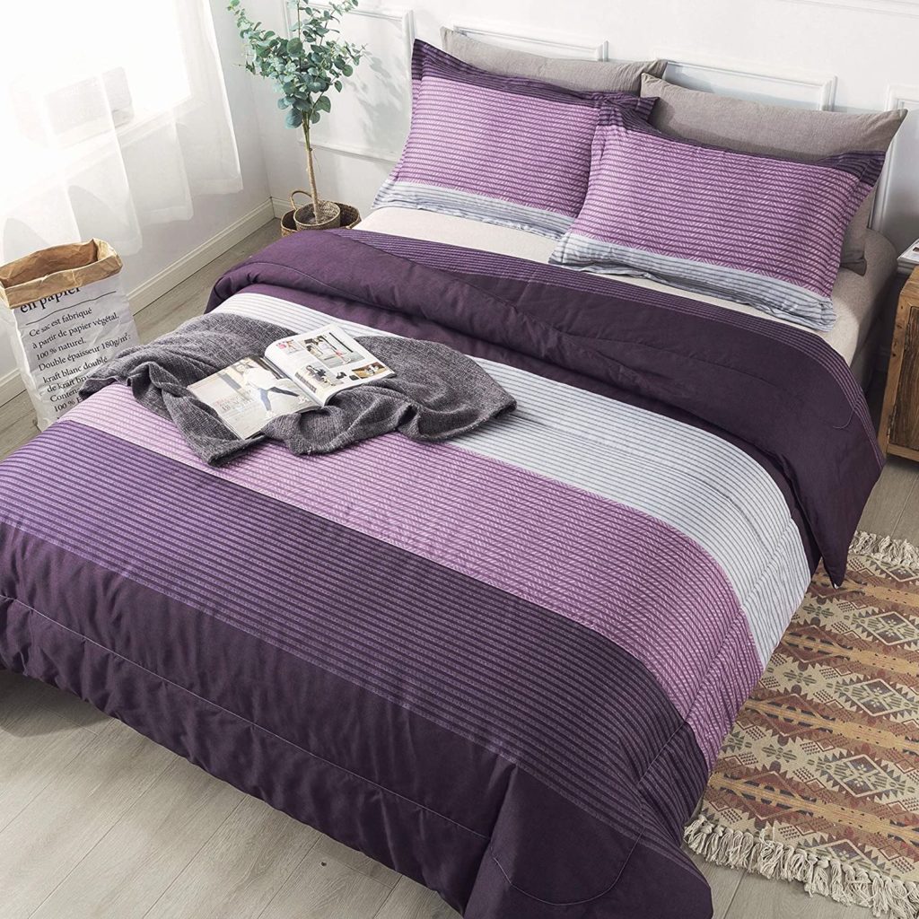 purple comforter with stripe pattern