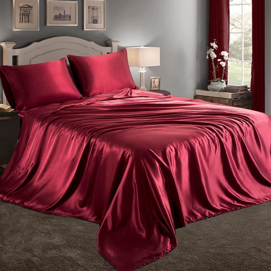 red satin sheets on bed