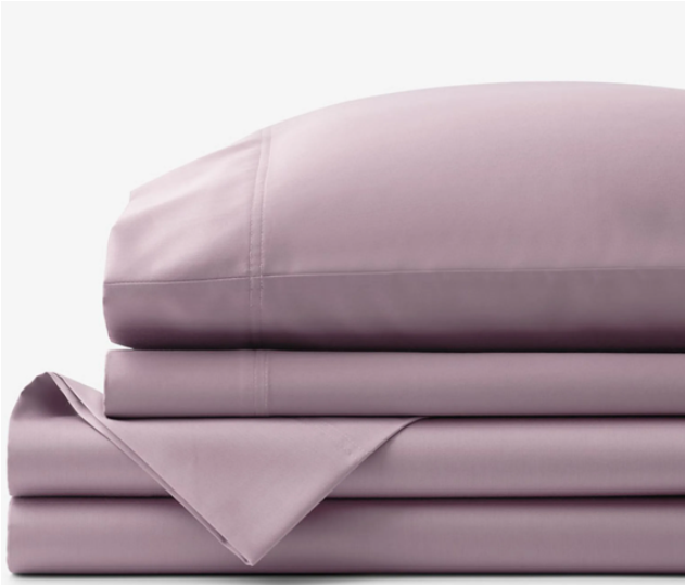 stacked mauve sheets and pillows