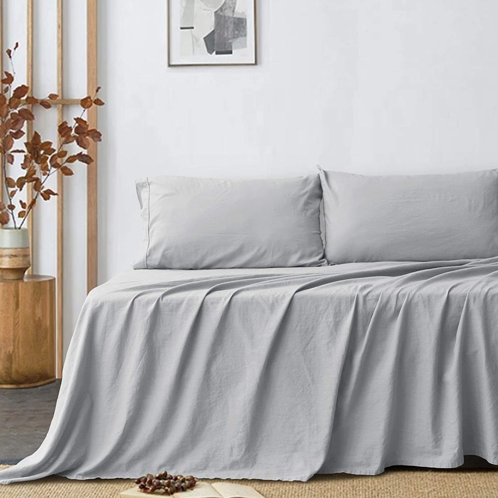trendy room with grey sheets