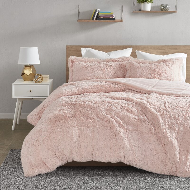 ultra plush pink bedding on bed