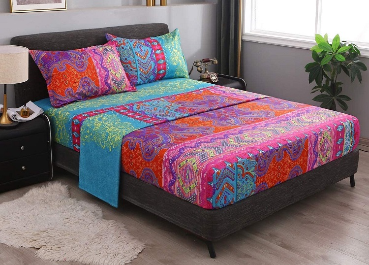 ultra vibrant colorful patterned boho fitted sheet on mattress