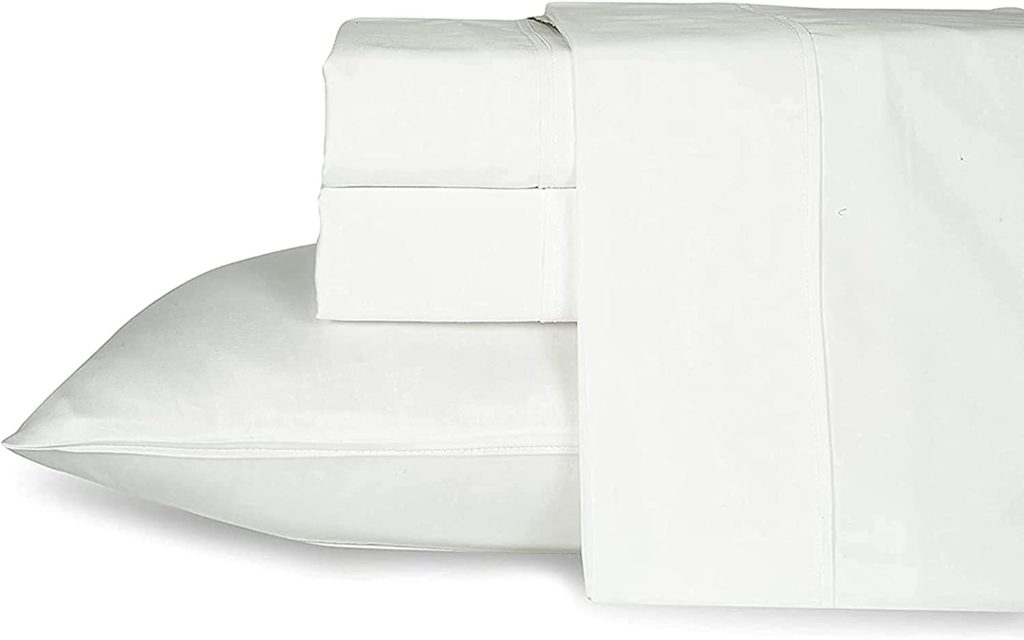 white sheet set stored in pillowcase