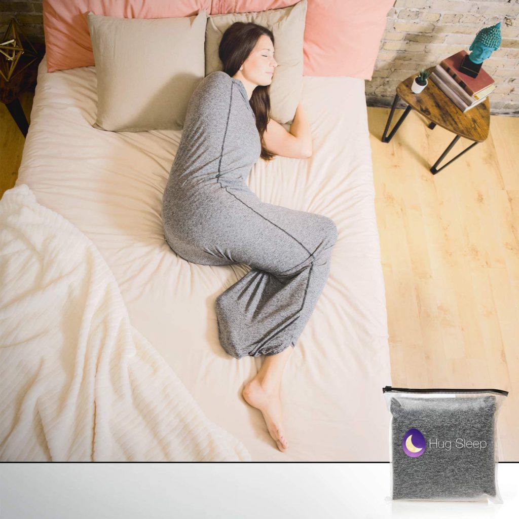 woman sleeping peacefully in compression pod blanket